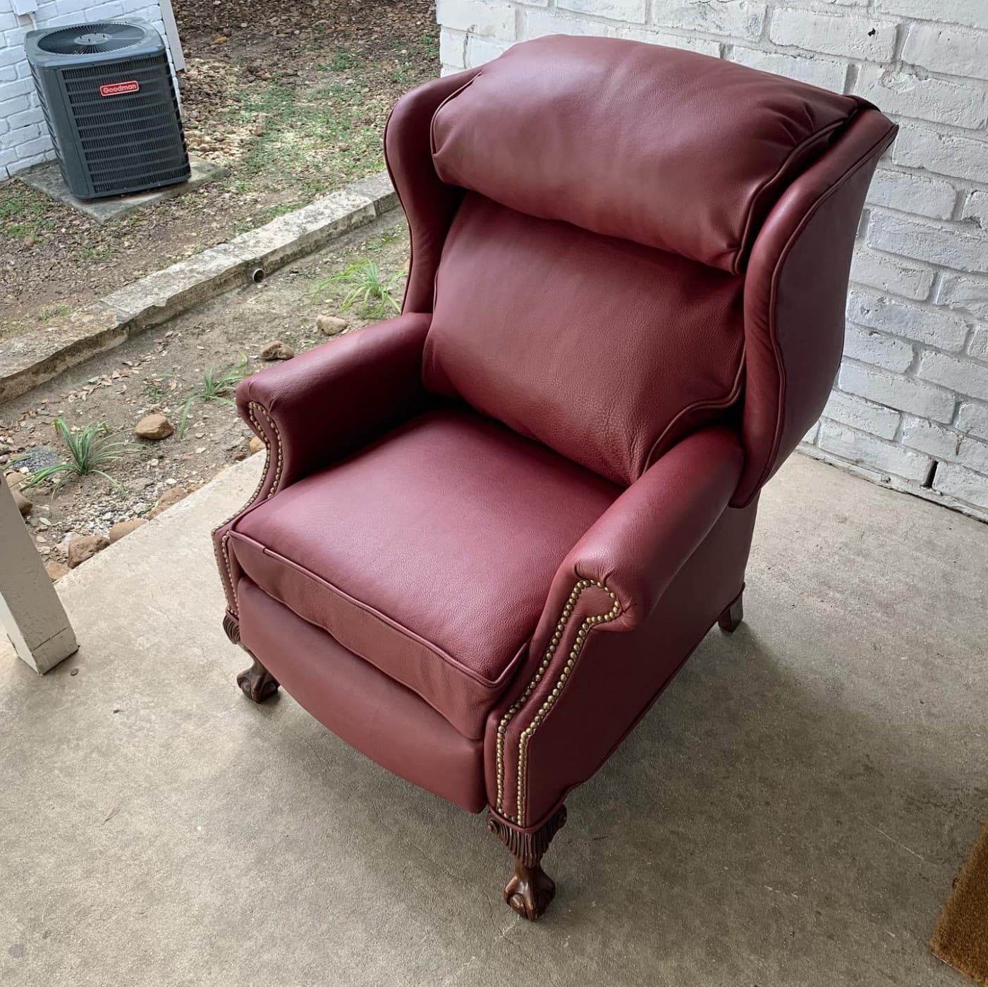 Burgundy leather recliner after complete restoration in Bucks County PA